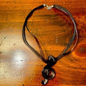 NWOT Handmade Bronze treble clef necklace